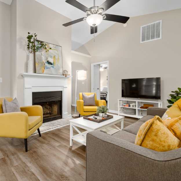 Sell with Me Button - Stock Image of living room with a fireplace - Sara Schrader NYS Licensed Real Estate Salesperson at Warren Real Estate